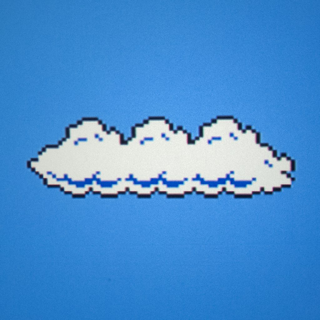 Fig. 4 Photograph of the projected image from Nestopia emulator. The blue background is perfectly smooth, the black contour is thinner, and the cloud appears flatter. Photo: Emilie Magnin. Courtesy of the Migros Museum für Gegenwartskunst.